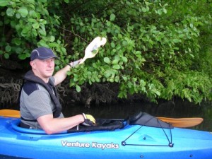 Piranaha Kayak Fishing Hand Paddle in the trees